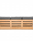 Teak outdoor sofa with gray cushions on a white background